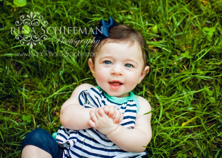 baby girl in grass portrait